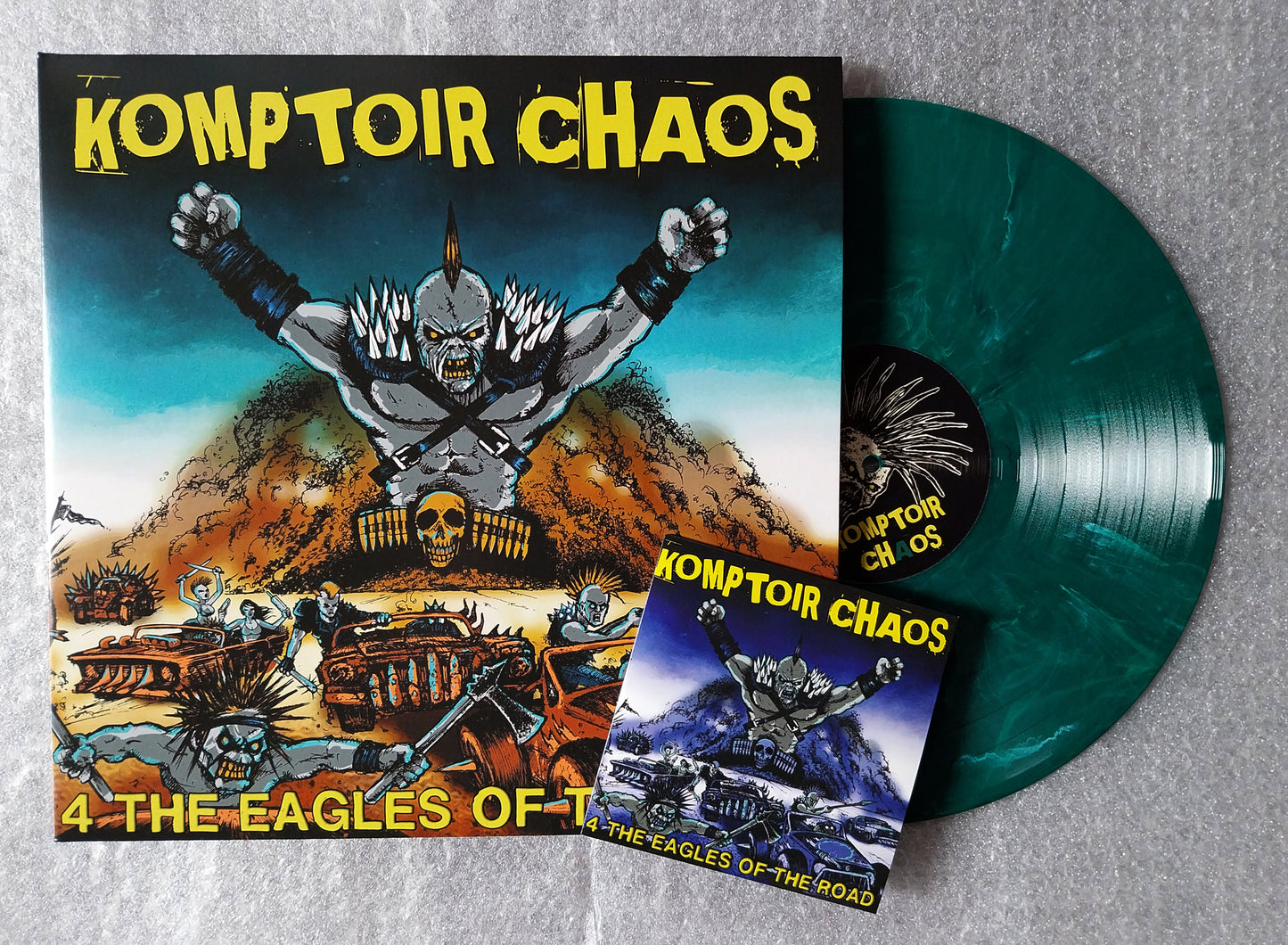 ACIDEZ - In Punk We Thrash - LPKomptoir Chaos – 4 The Eagles Of The Road - lim. green marbled LP + CD